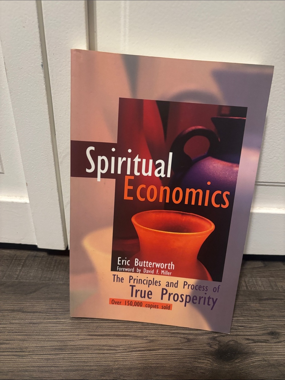 Spiritual Economics by Eric Butterworth - Orange & Purple Cover